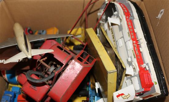 A collection of toy cars and books